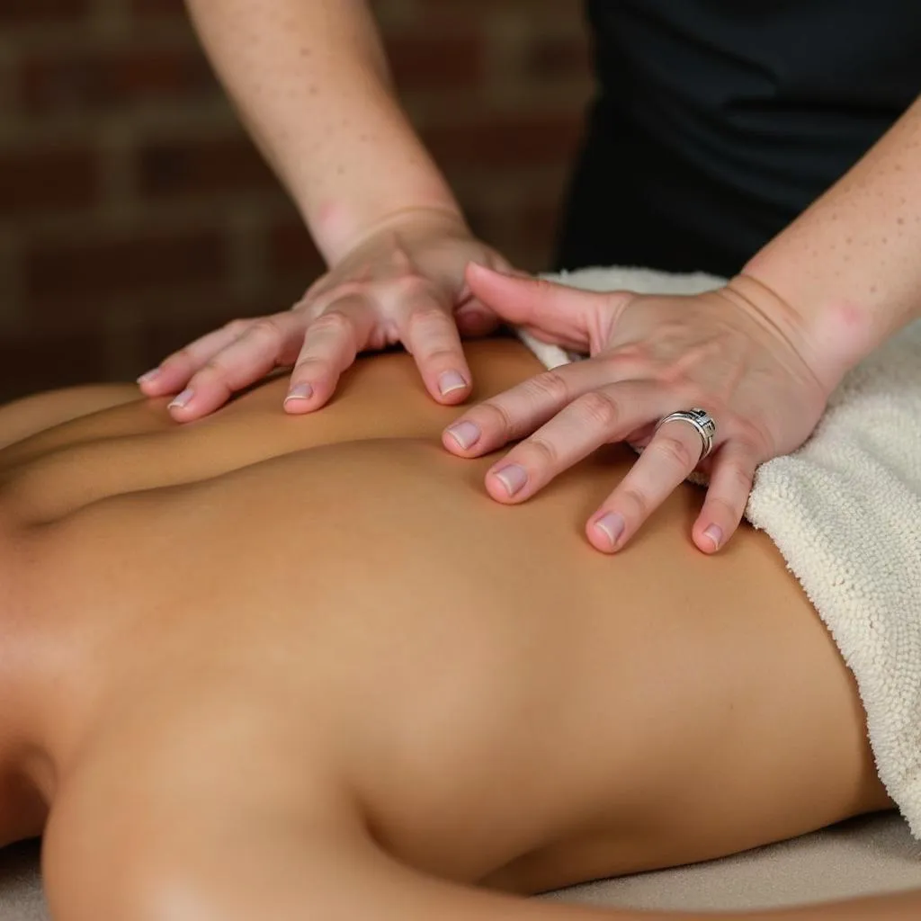 Skilled Therapist Performing Ayurvedic Massage