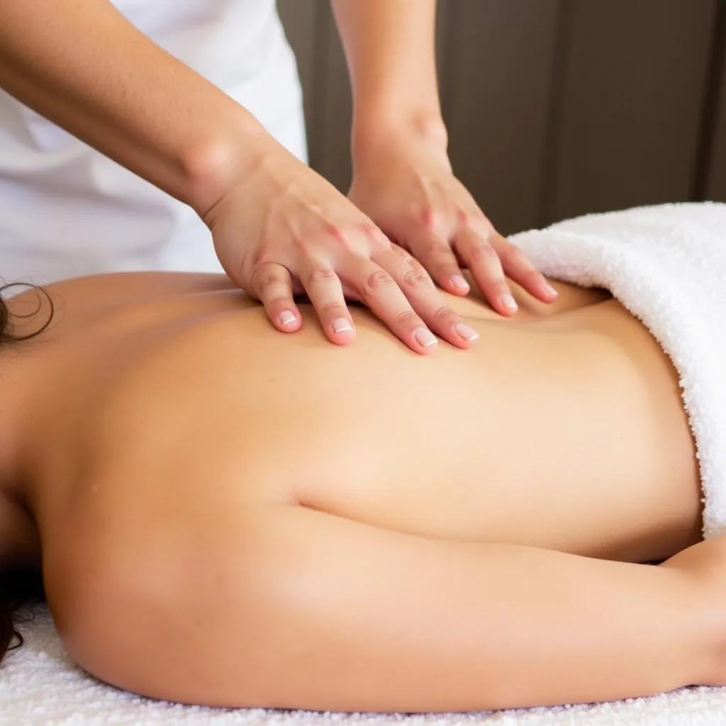 Skilled Therapist Performing a Massage at Aurah Spa Indiranagar