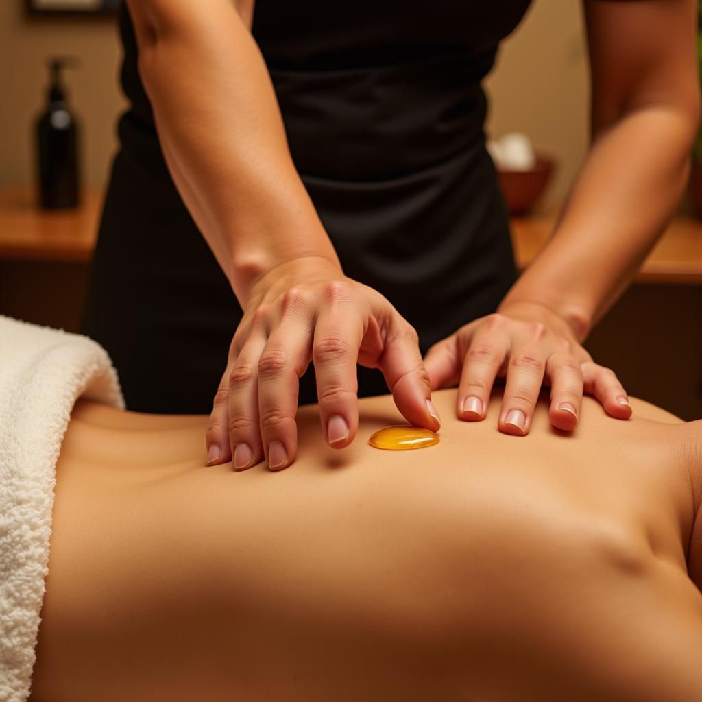 Body to Body Massage Therapist Applying Oil