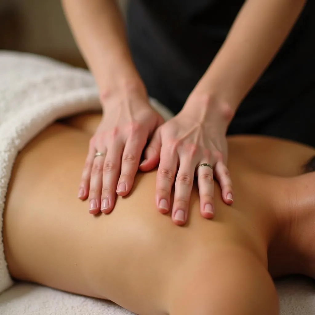 Skilled practitioner performing Angles Thai Spa massage