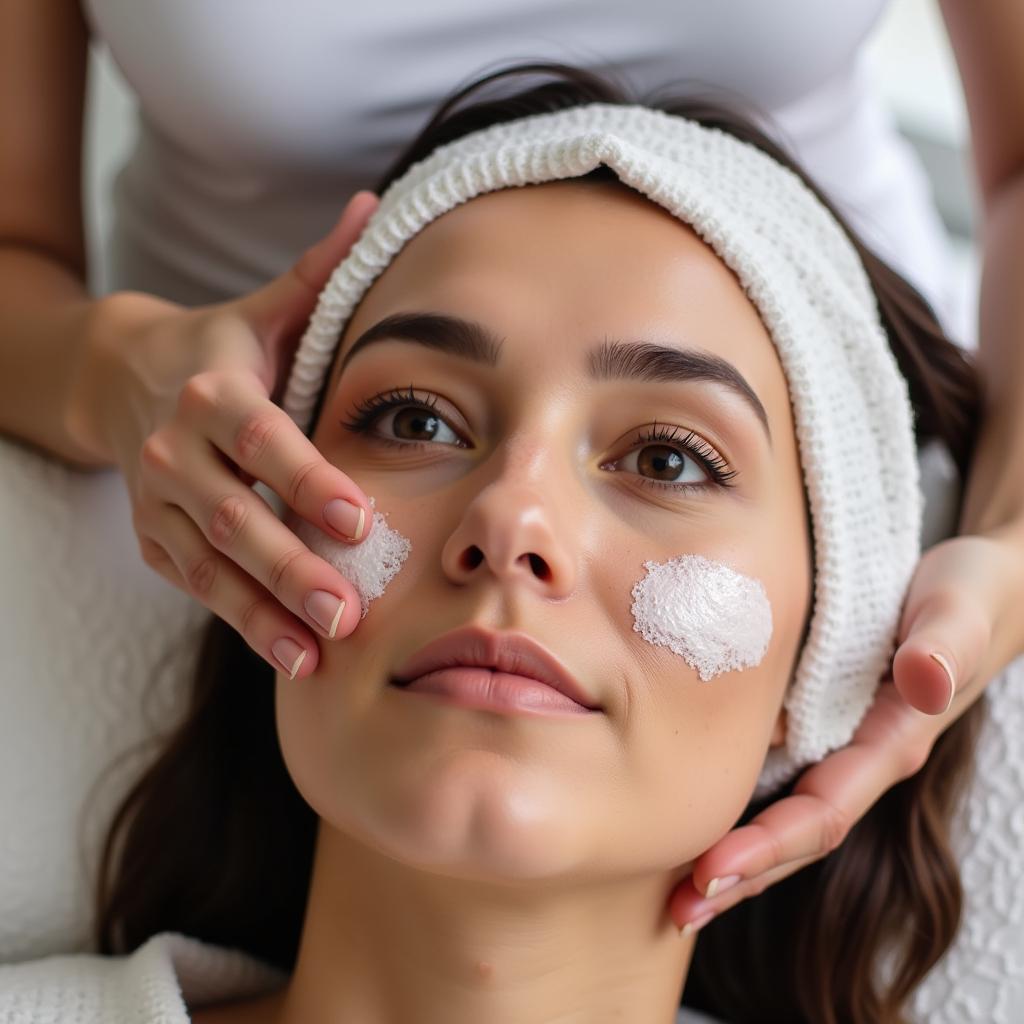 Woman receiving a facial treatment