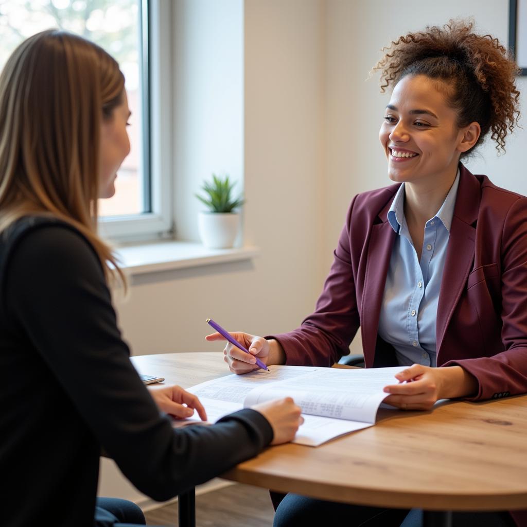 Aulla Spa Consultation: Therapist discussing treatment plan with a client