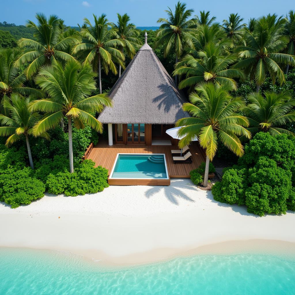 Luxurious beach villa nestled among lush tropical foliage at Emerald Maldives Resort