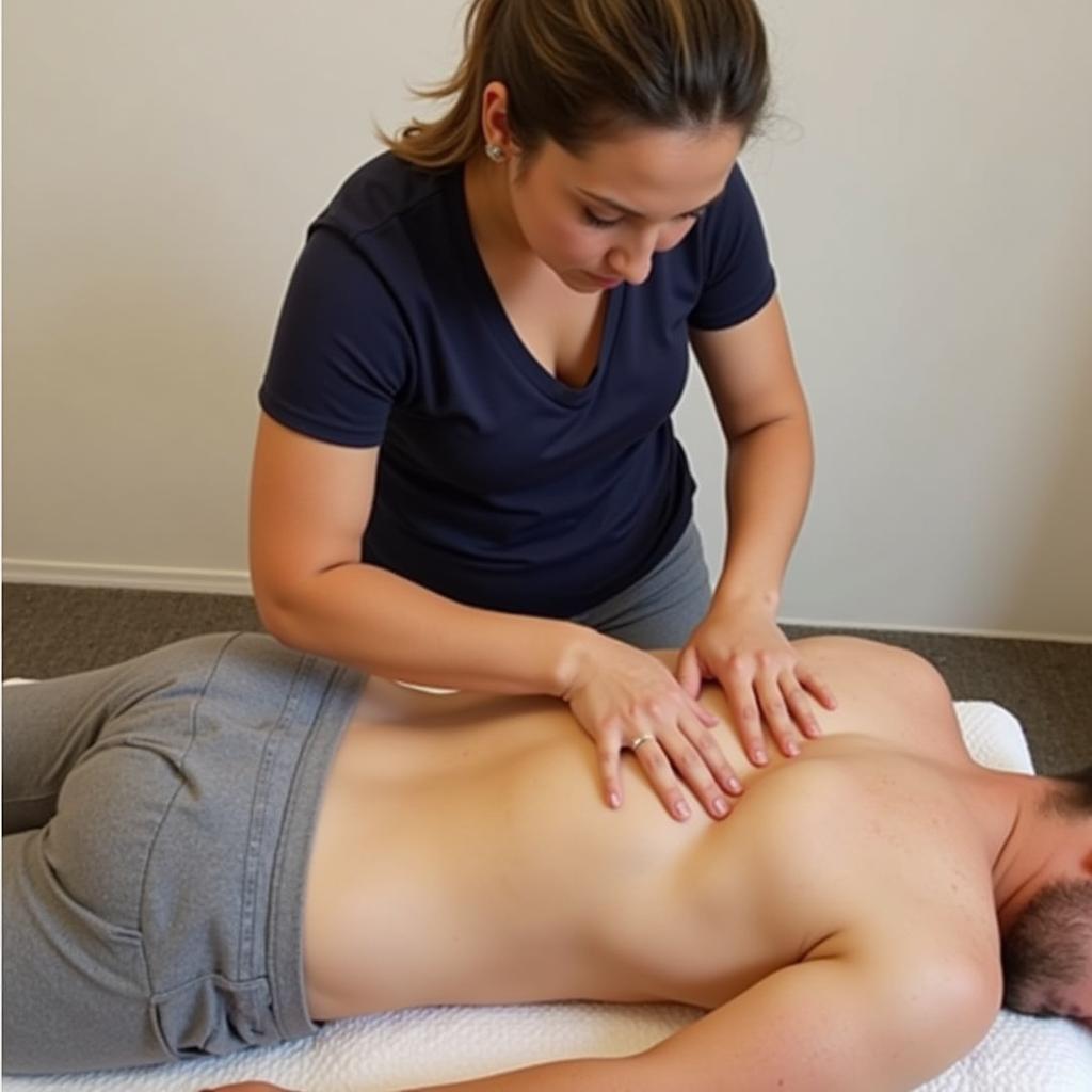 A therapist performing a massage at an Evercompounds Spa